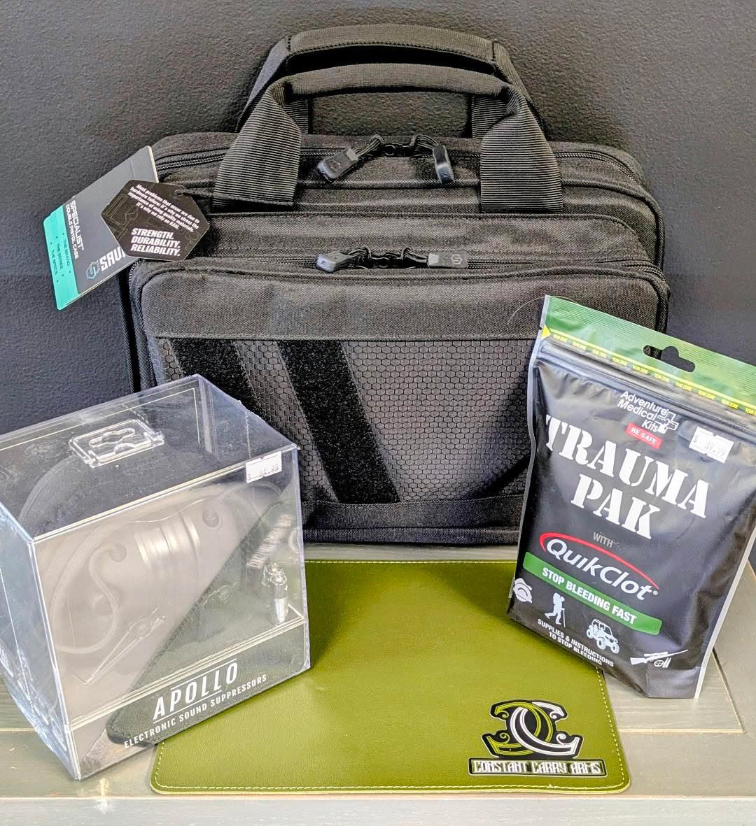 Range bag with Apollo suppressors and QuikClot trauma kit